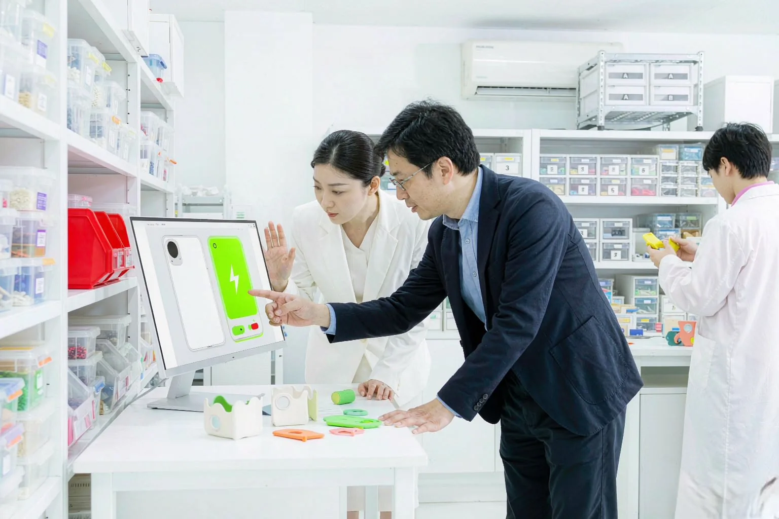 CYES Silicone engineering team reviewing a custom silicone product